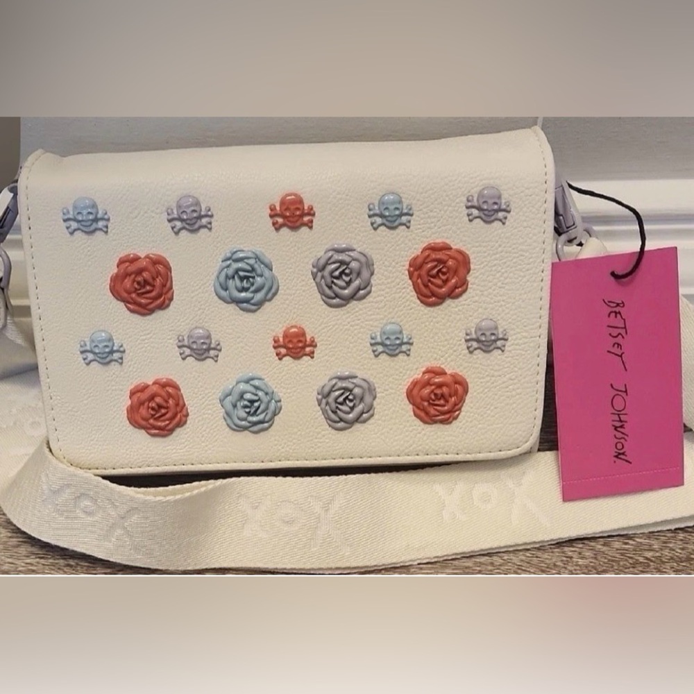 Betsey Johnson White Crossbody Bag with Pink, Blue & Gray Floral and Skull Studs